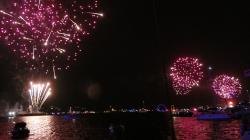 Synchronized fireworks from three barges